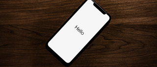 IPhone with Hello on the screen