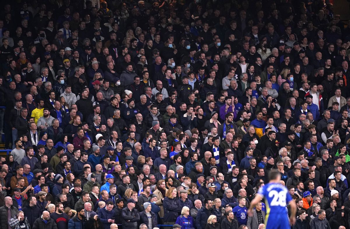 Fans in the safe-standing area watching the action at Stamford Bridge