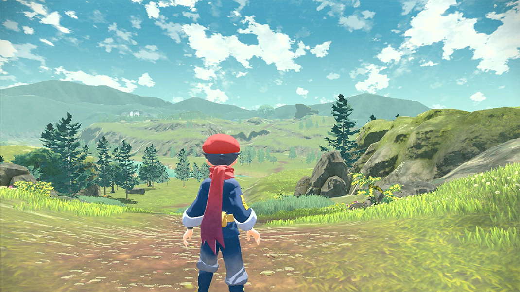 Pokémon Legends Arceus: a trainer looks out over a vast landscape
