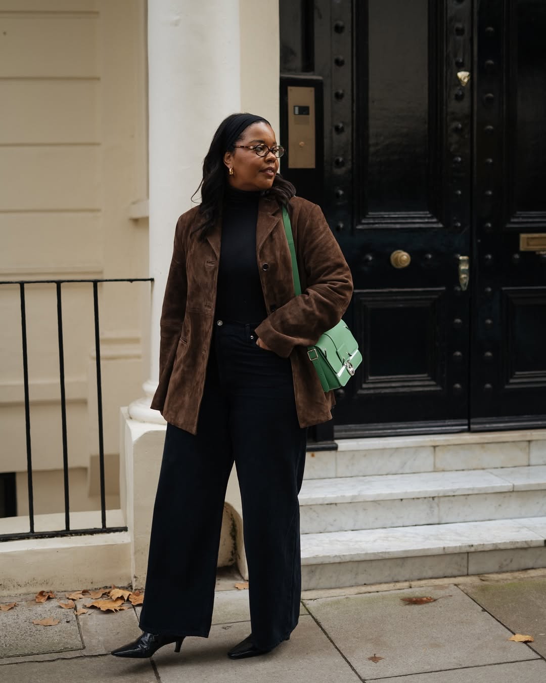 Woman wearing a suede jacket