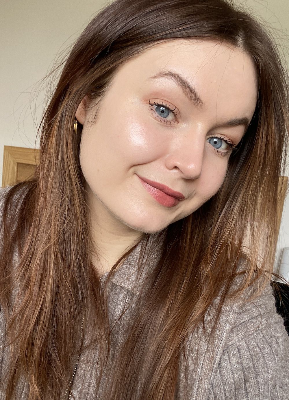 Lucy wearing Jones Road The Lip Tint in Nude Rose