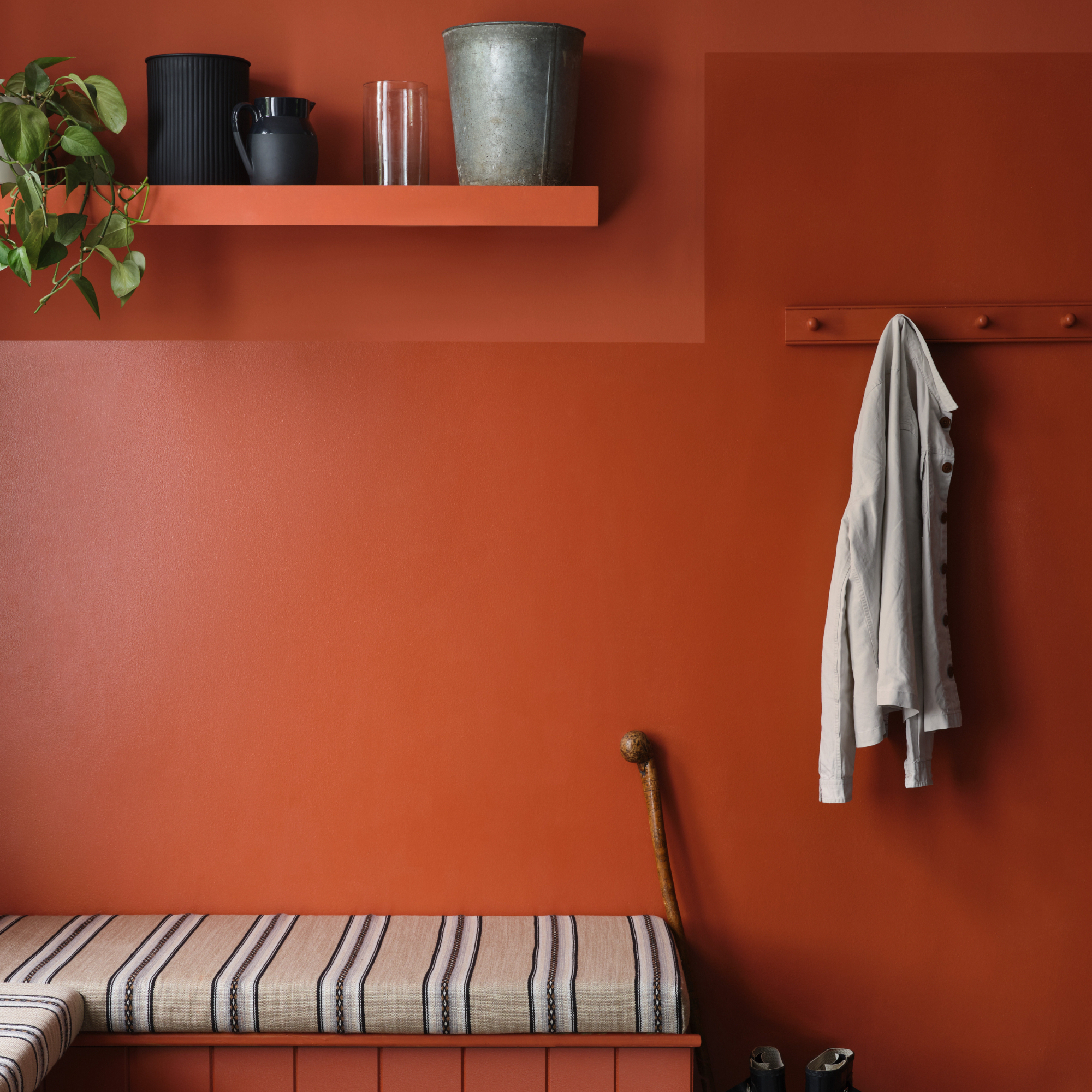 utility room colour ideas, orange utility room with matt and gloss paint finishes, bench seat, open shelving, peg rail