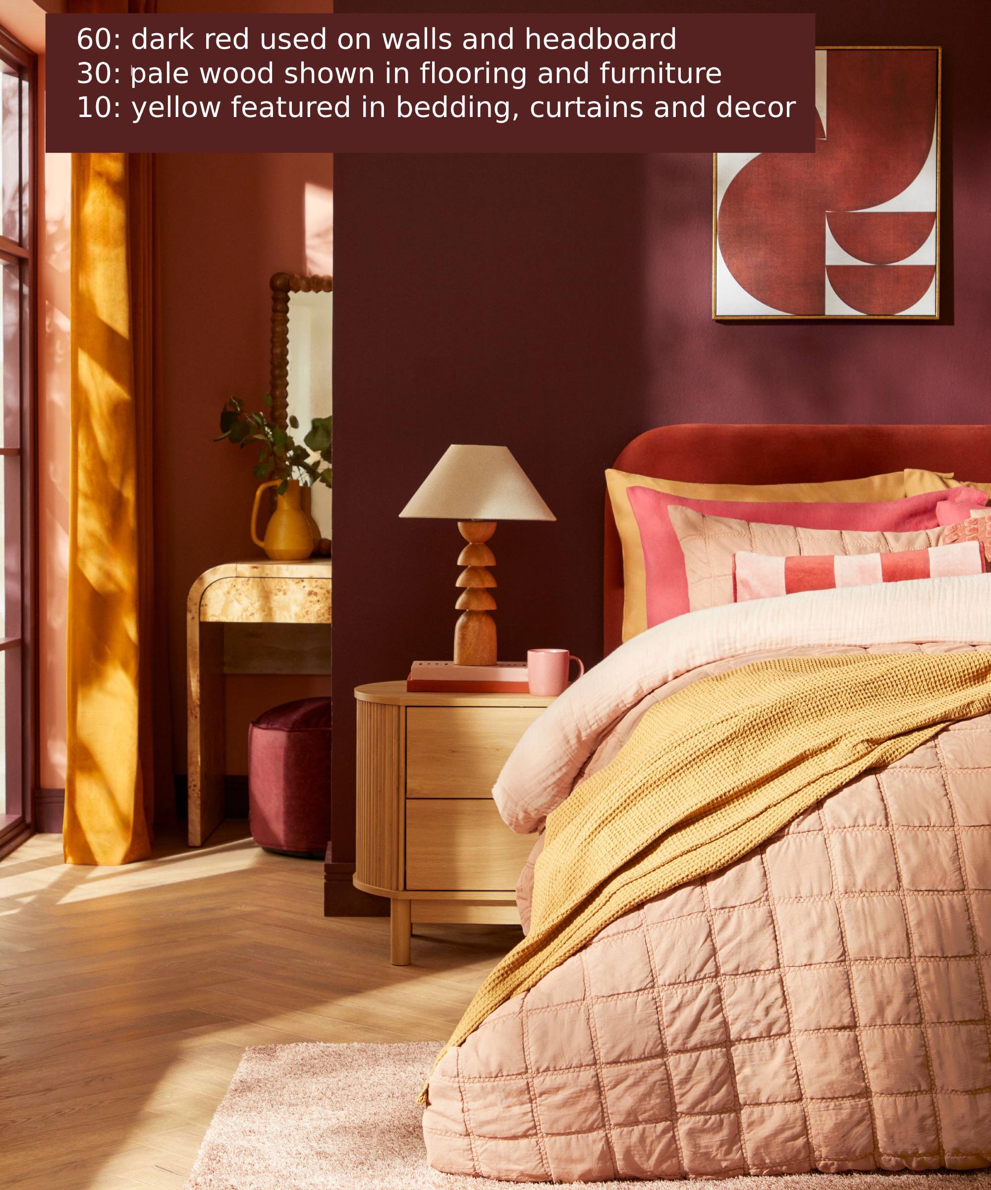 A bedroom with a red, yellow and pale wood color scheme