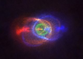 The Atacama Large Millimeter/submillimeter Array captured the bright blue and red clouds of gas surrounding the binary star system known as HD101584. The larger star of this system swallowed its lower mass companion. Gas was shed from the outer layers of the red giant star as the smaller star spiraled inward.