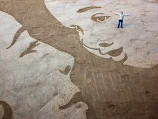 What better Mother's Day present than a huge sand illustration?