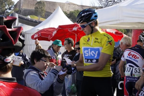 Overnight race leader Edvald Boasson Hagen (Sky) signs an autograph before the start of stage 3.