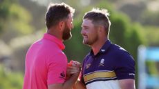 Jon Rahm and Bryson DeChambeau shake hands at LIV Golf Adelaide 
