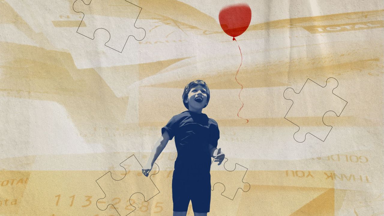 boy jumping with a ballon