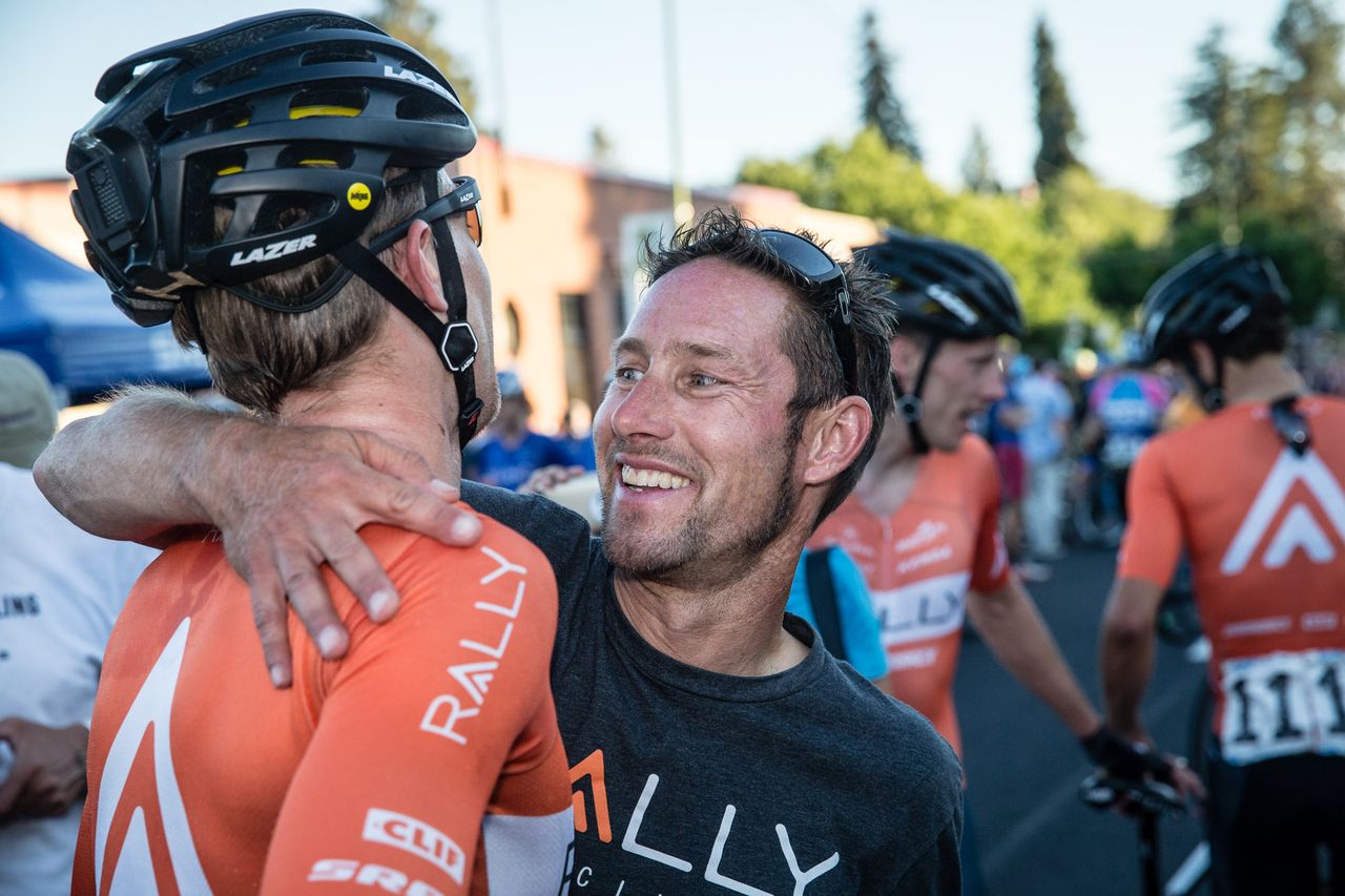 Rally team director Eric Wohlberg congratulates Shane Kline after taking the win