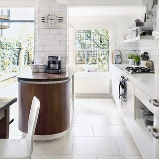 Kitchen room with white wall and window