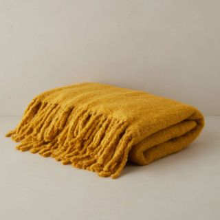 dark yellow throw blanket