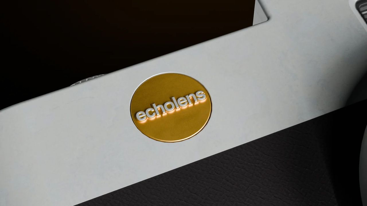 A close-up product image of the Echolens retro compact camera on a dark background