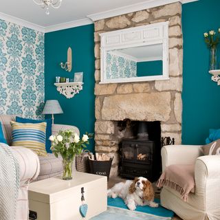 living room with teal colour wall