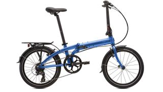 A Tern Link C8 in blue colour with rack and mudguards against a white background