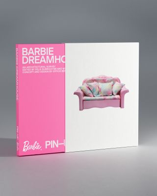 Barbie Dreamhouse book cover in pink and white with pink sofa image