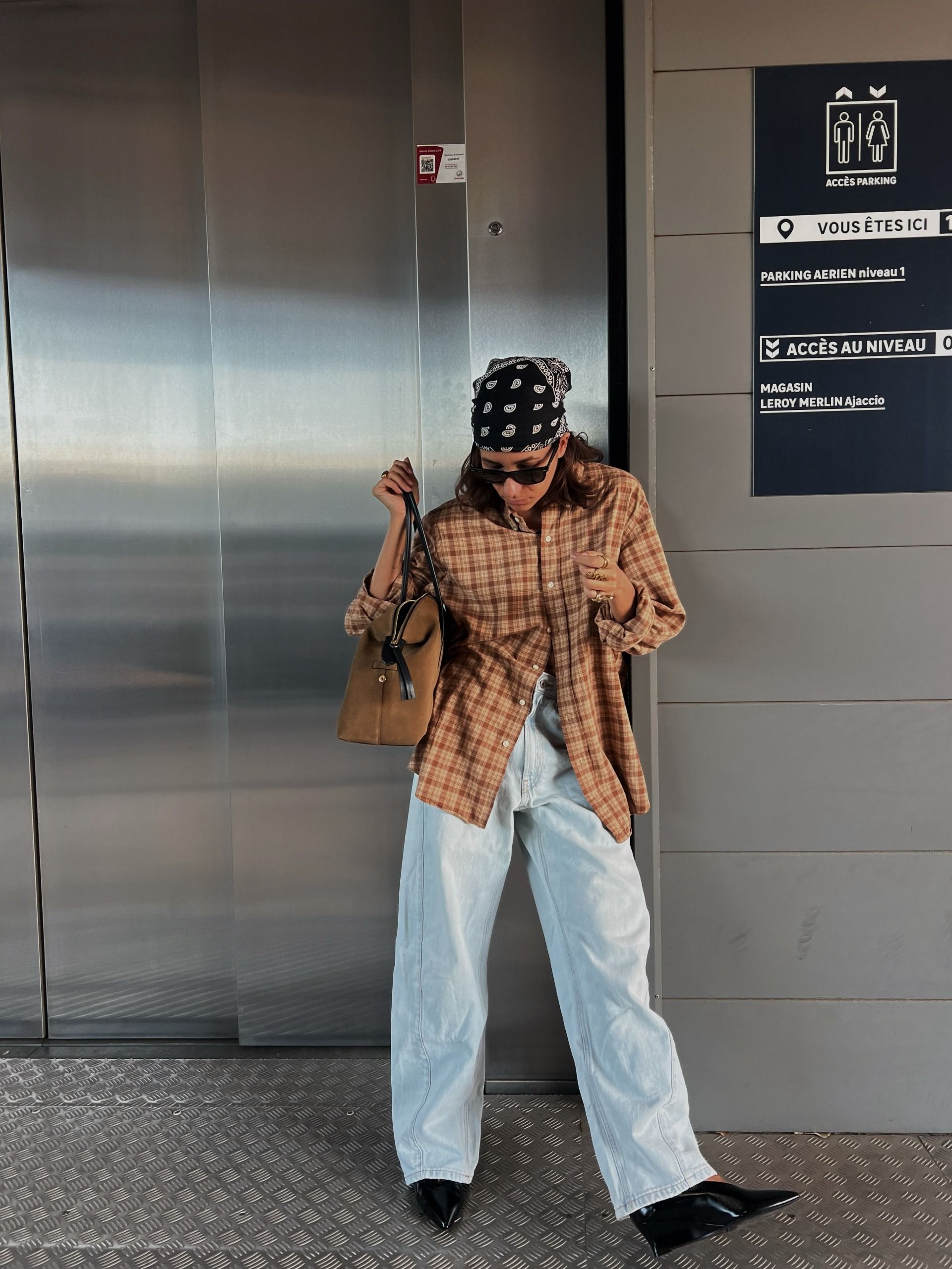 An image of a woman wearing updated fall outfit 2026