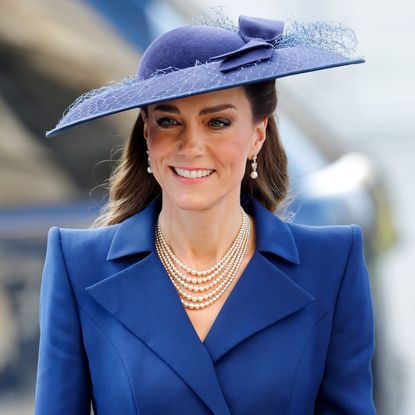 Princess Kate in a hat and blue coat on Commonwealth Day