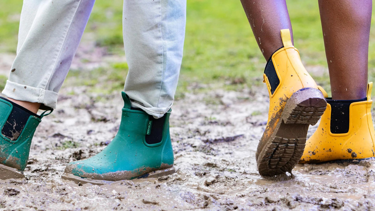 wellies in the rain and mud at a festival