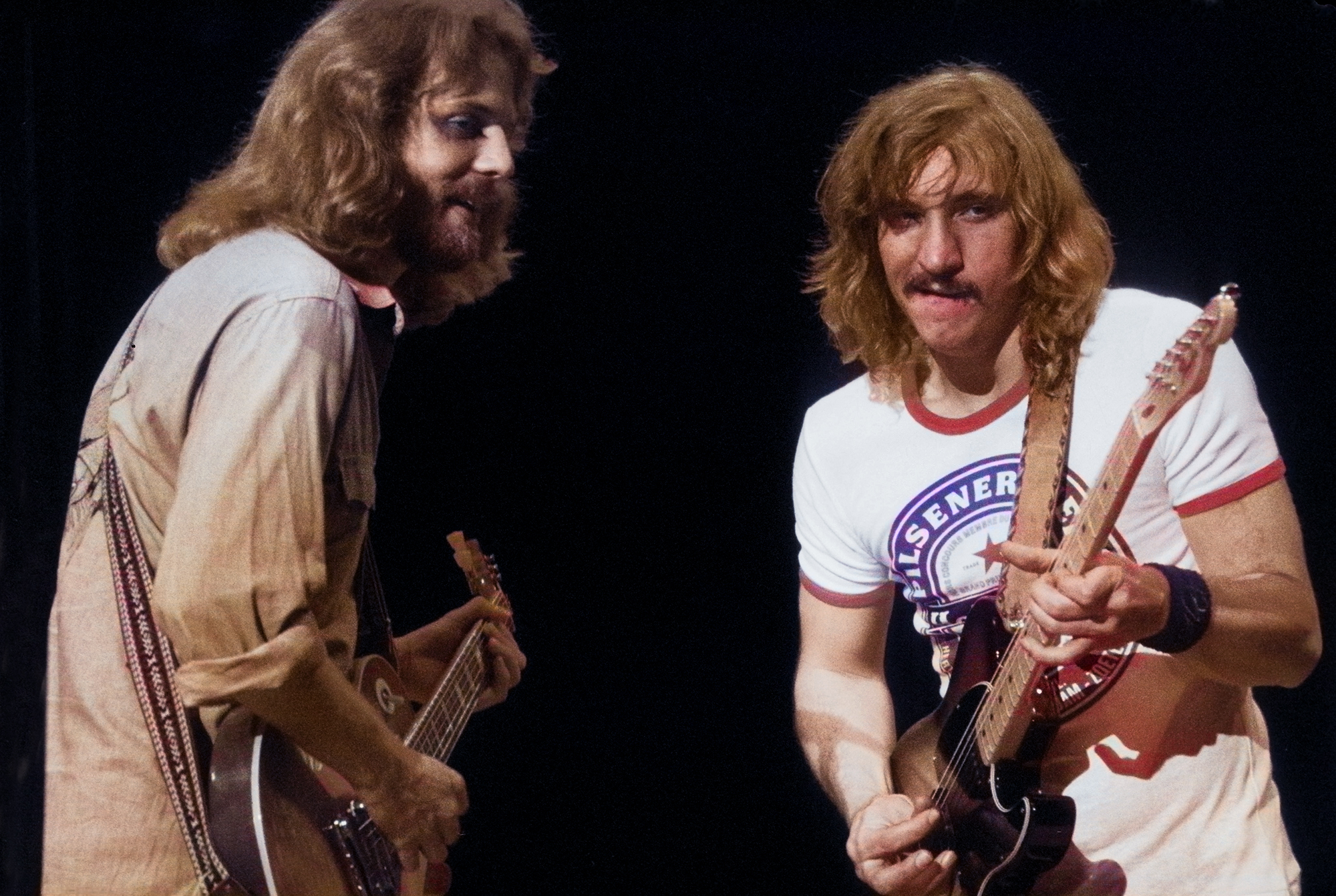 (L-R) Don Felder and Joe Walsh of The Eagles perform on stage at Ahoy on 11th May 1977 in Rotterdam, Netherlands.