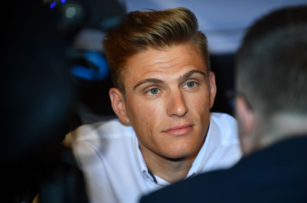 Marcel Kittel listening to the question from the reporter