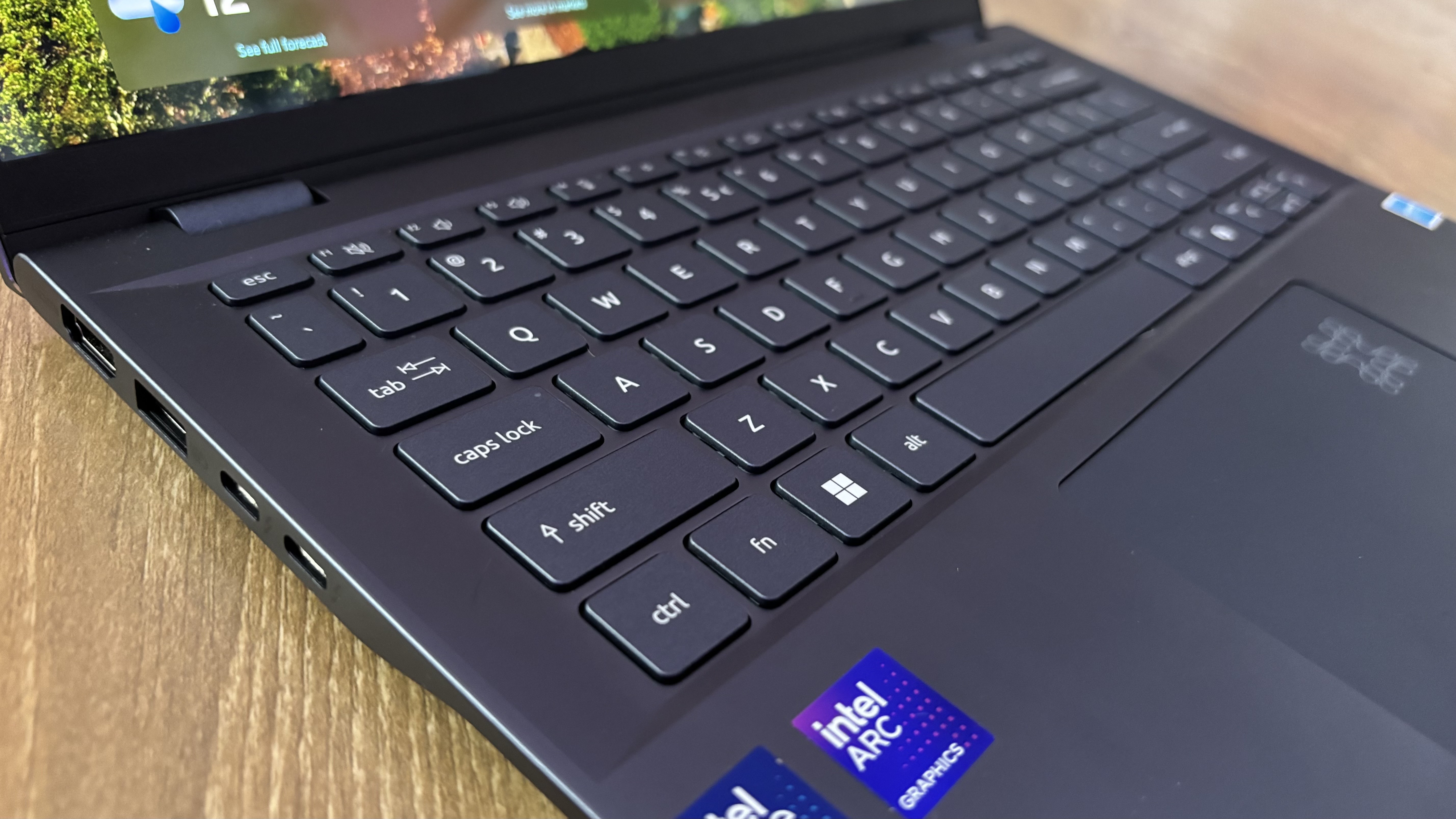 The Acer Aspire 14 AI's keyboard and left-side ports