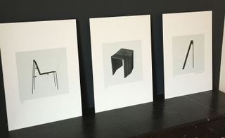 Three framed pictures in black and white of objects