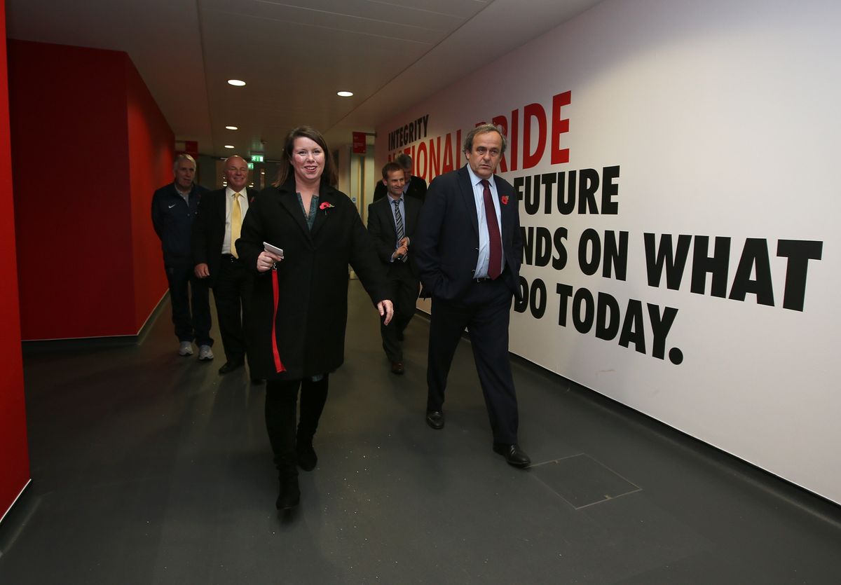 Julie Harrington with Michel Platini at St George's Park in 2014