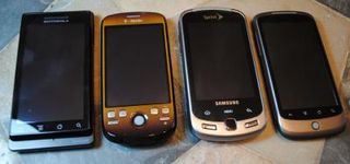 From left, Motorola Droid, myTouch 3G Fender, Samsung Moment, Nexus One