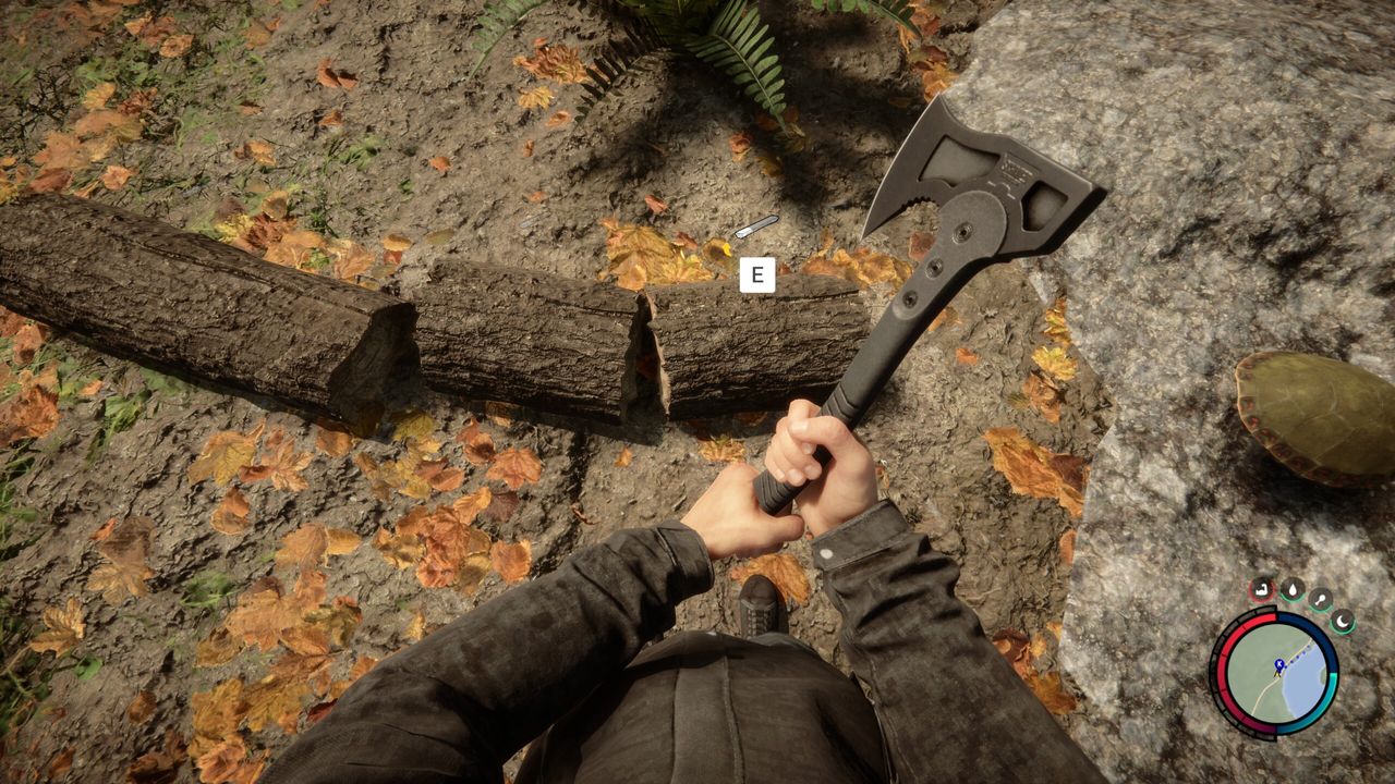 sons of the forest hands holding an axe chopping firewood