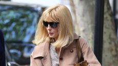Kelly Reilly wearing straight leg jeans on May 06, 2026 in London, England