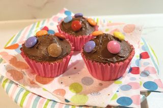 Cupcakes decorated with chocolate and Smarties