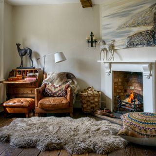 reading area with fire place and cosy carpet