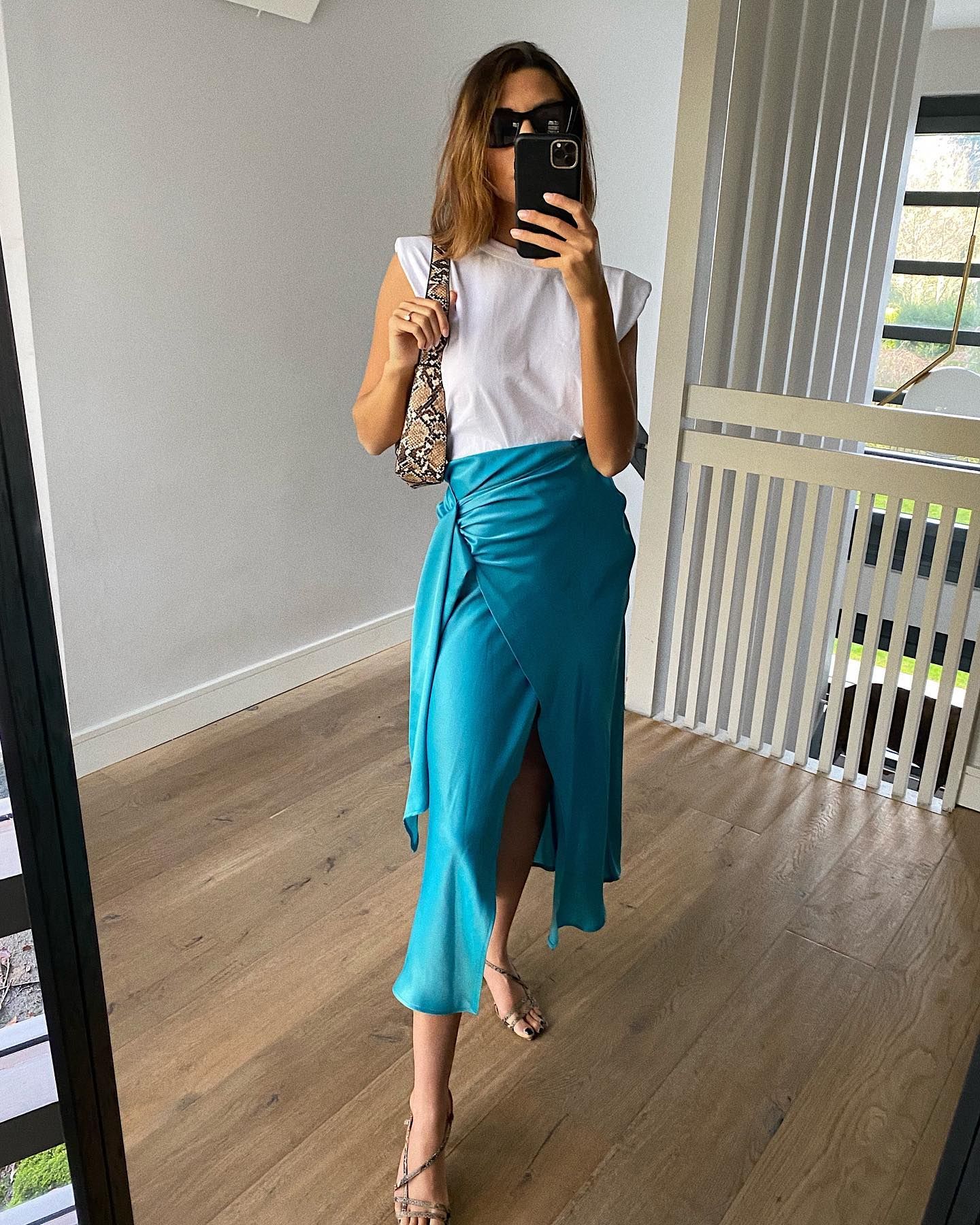 A picture of the best skirts for petites, as styled on @smythsisters.