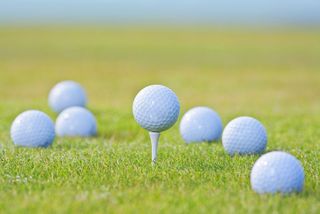 golf balls on grass