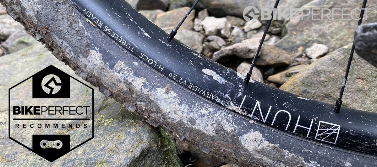 Hunt Trail Wide V2 wheels resting on rocky singletrack