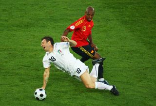 Italy's Antonio Cassano is fouled by Spain's Marcos Senna at Euro 2008.