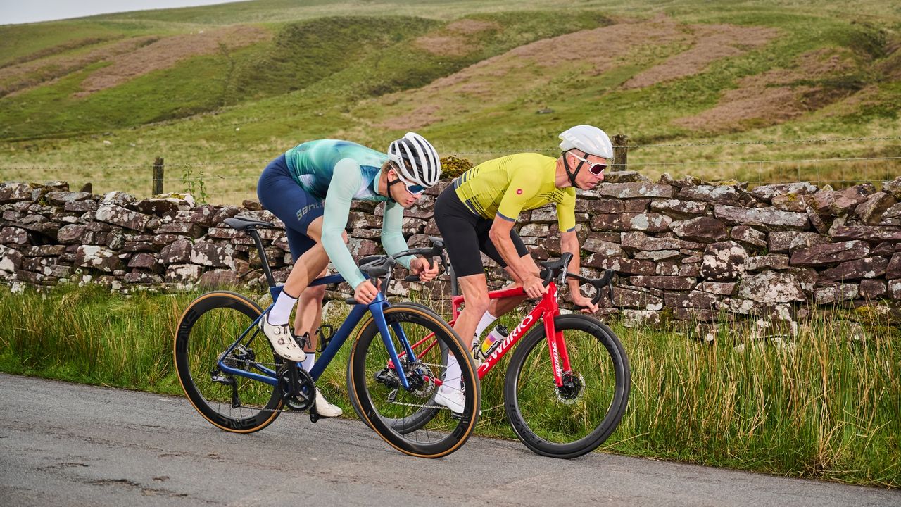 Two cyclists riding two of the best road bikes