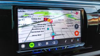 A Waze map running on Android Auto in transit.