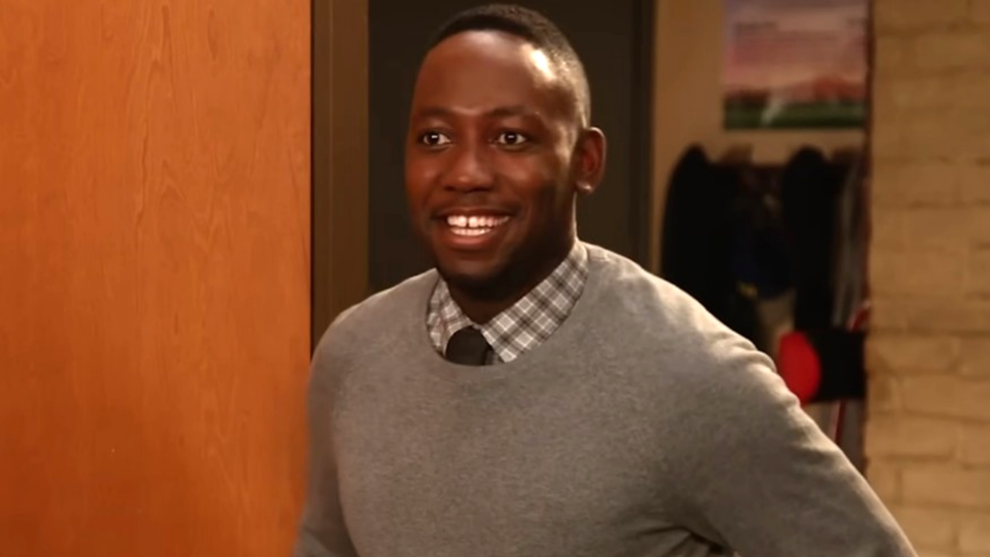 Screen shot of Lamorne Morris smiling in New Girl.
