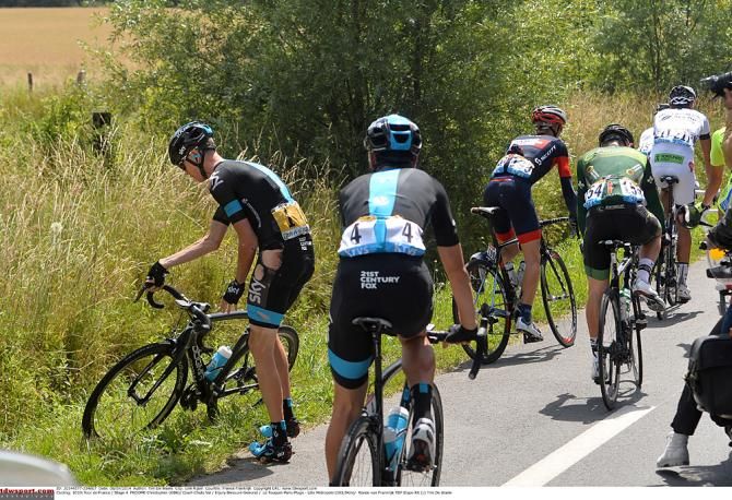 Defending champion Chris Froome (Team Sky) crashes during stage 4