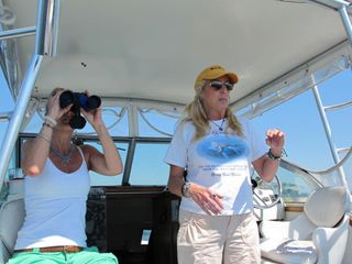 Captain Lori DeAngelis, aka "The Dolphin Queen" on her boat in Orange Beach, Ala.