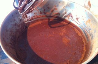 Mixing ingredients for chocolate cola cake