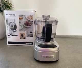 Cuisinart Mini Prep Plus Food Processor in front of its box