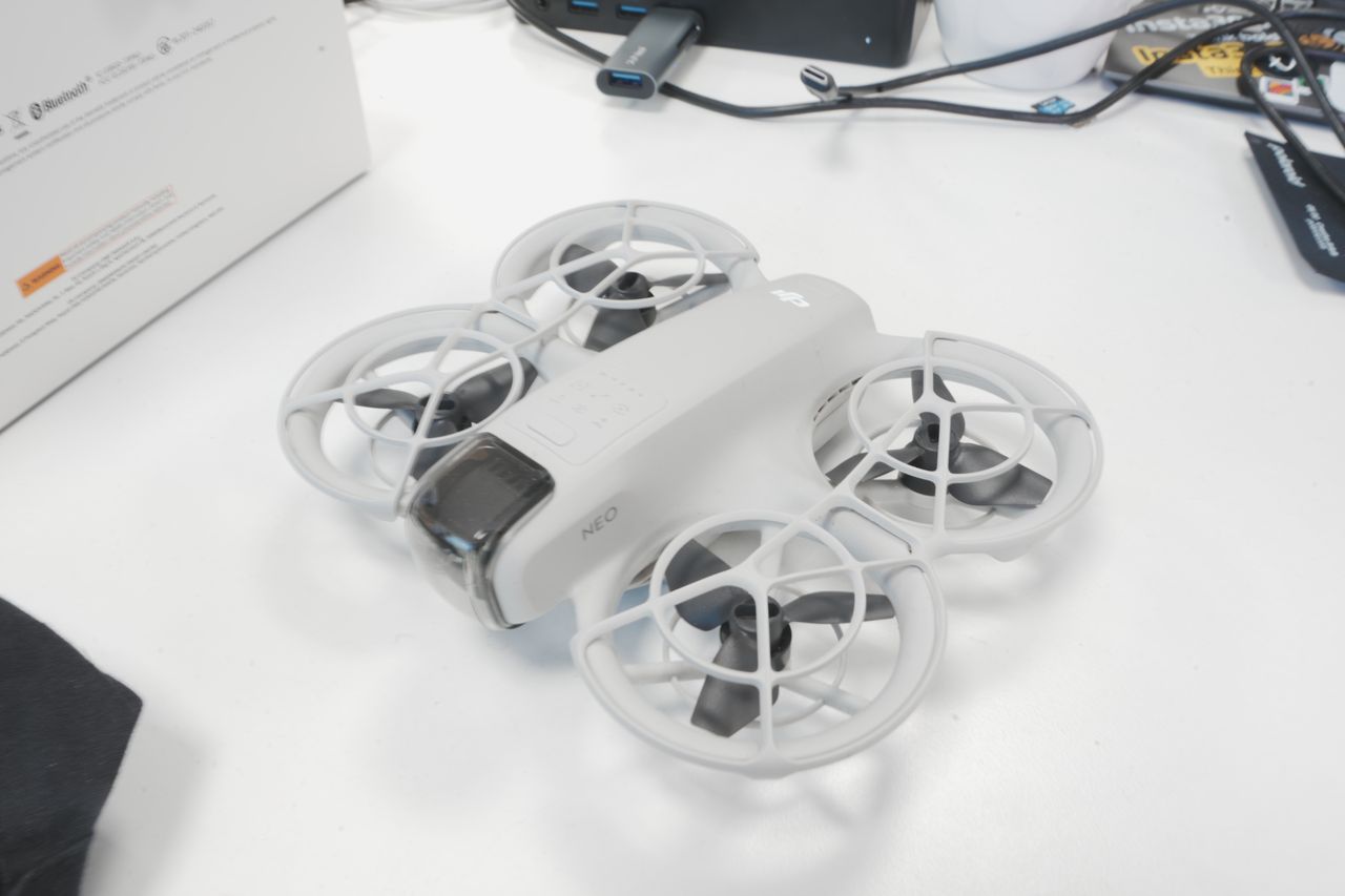 A photo of a DJI Neo drone, taken on a Sony A1 II mirrorless camera and with a Sony FE 28-70mm F2 GM lens