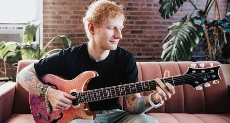 Ed Sheeran with his new PRS SE Hollowbody Piezo Baritone