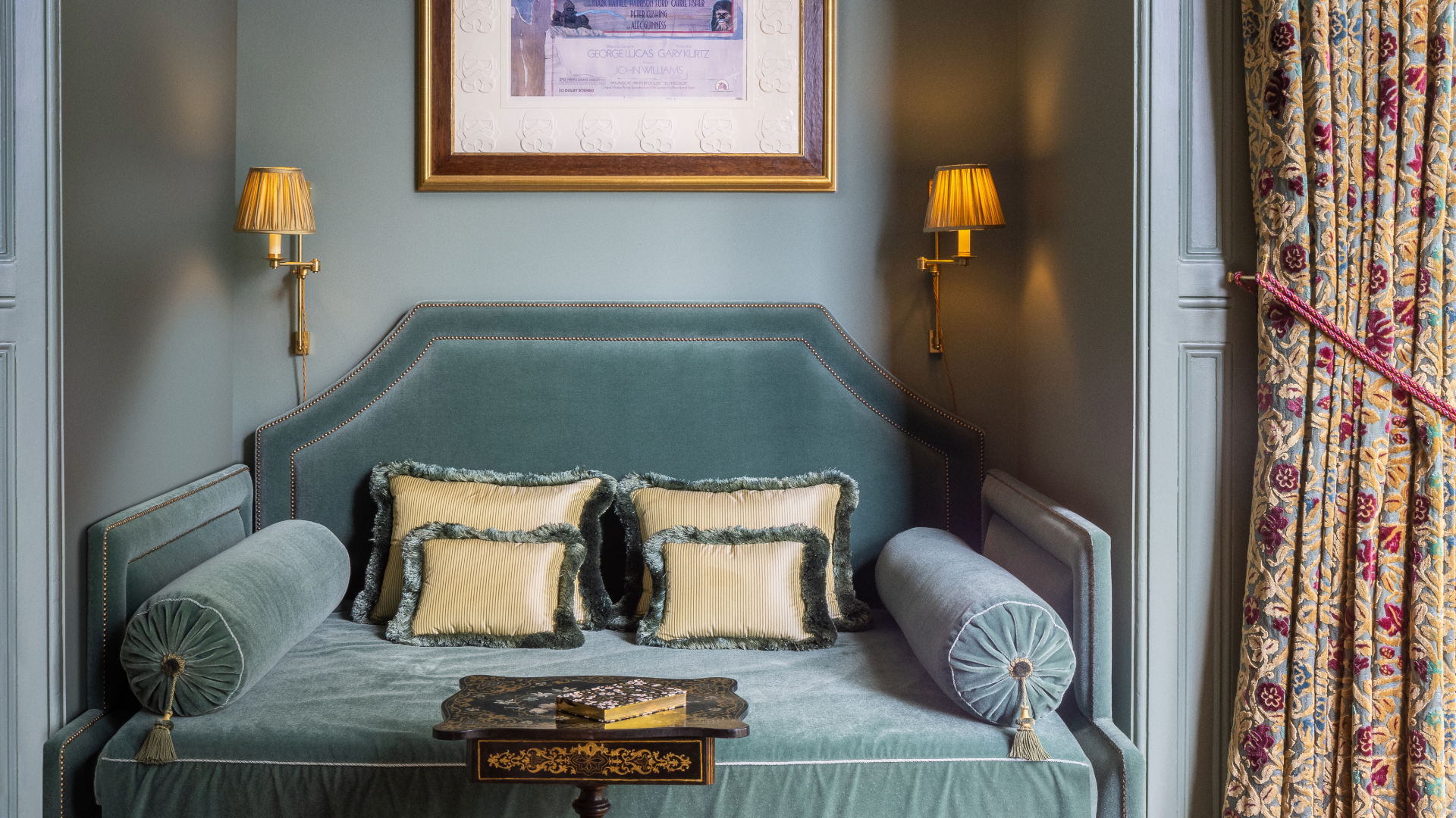 Chintz curtains in blue living space