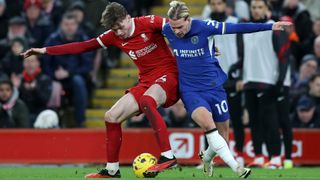 Mykhaylo Mudryk (R) battles with Conor Bradley (L) at Liverpool vs Chelsea 2024
