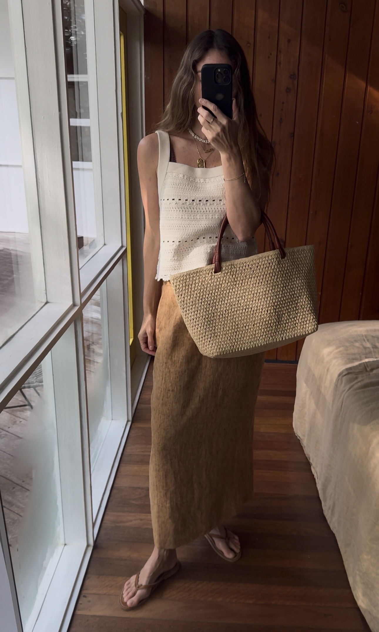 Angie wears the S&amp;eacute;zane Aya Top, skirt and Doen bag