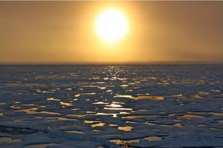 The sun sets on the Arctic Ocean.