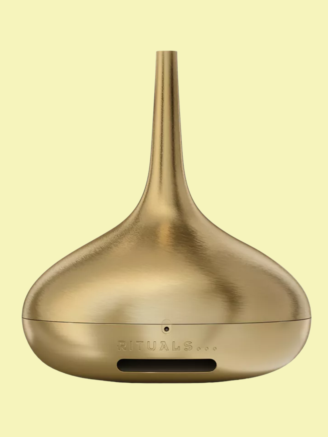 A brushed gold electric diffuser from Rituals